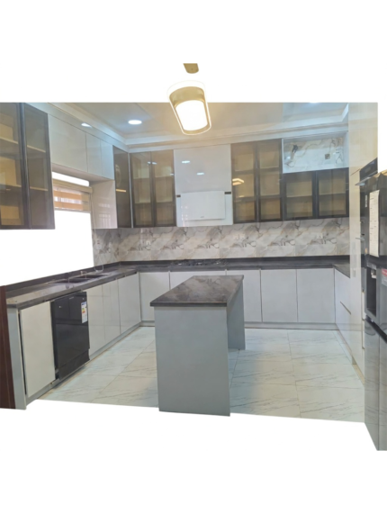 L-Shaped Modular Kitchen Cabinet Set with Grey Glossy Cabinets, Marble-Effect Backsplash, Black Countertops, and Central Island